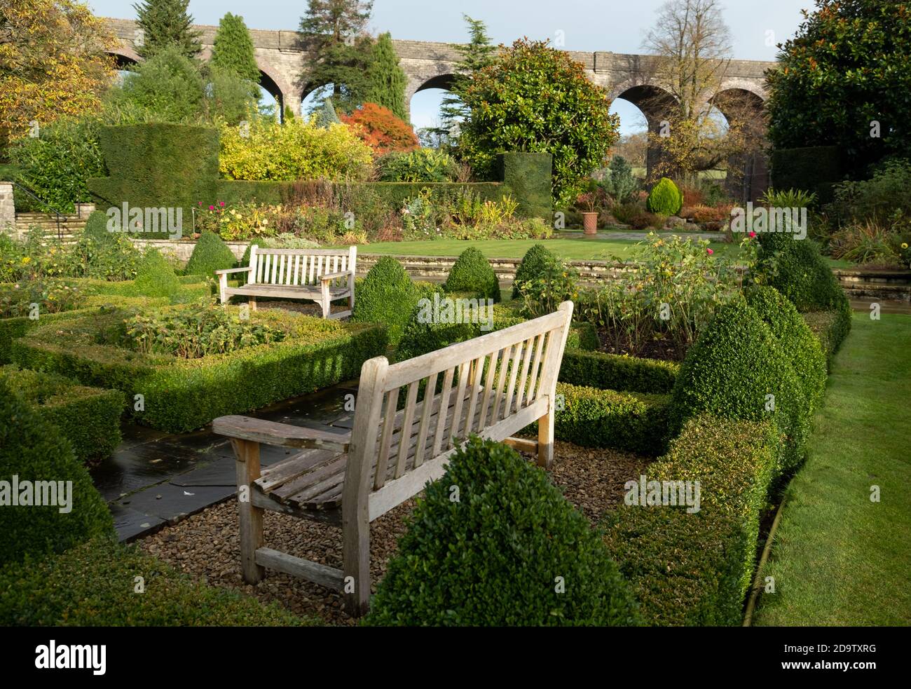 Kilver Court Gardens, bench at historic lakeside garden in Shepton