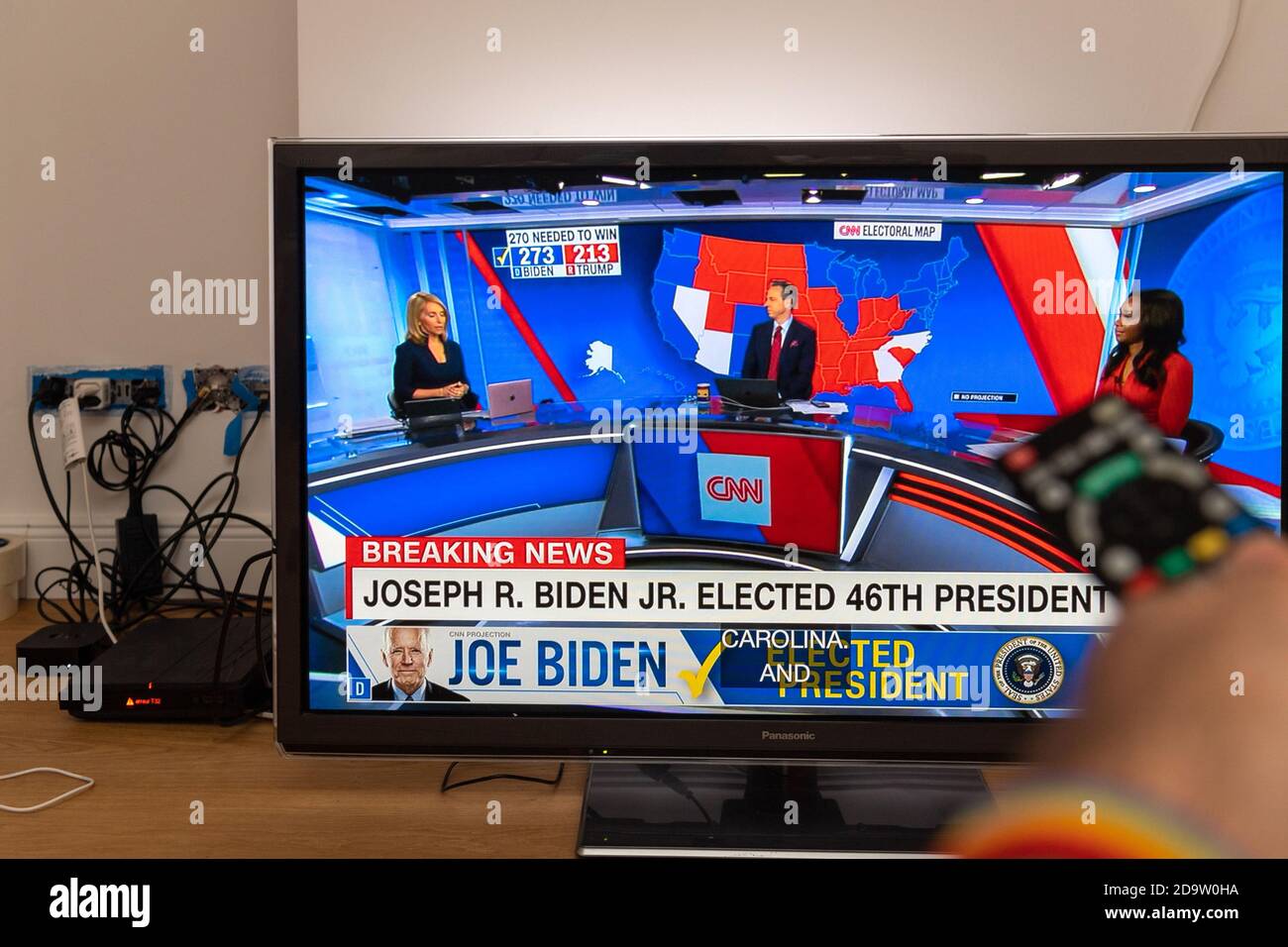 Paris, France - Nov 7, 2020: Man POV watching debates latest breaking news - Joseph R Biden Jr elected 46th president of the Untied States of America Stock Photo