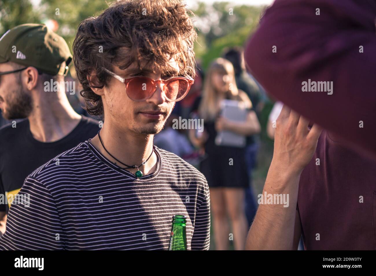 Lonely man in crowd hi-res stock photography and images - Alamy