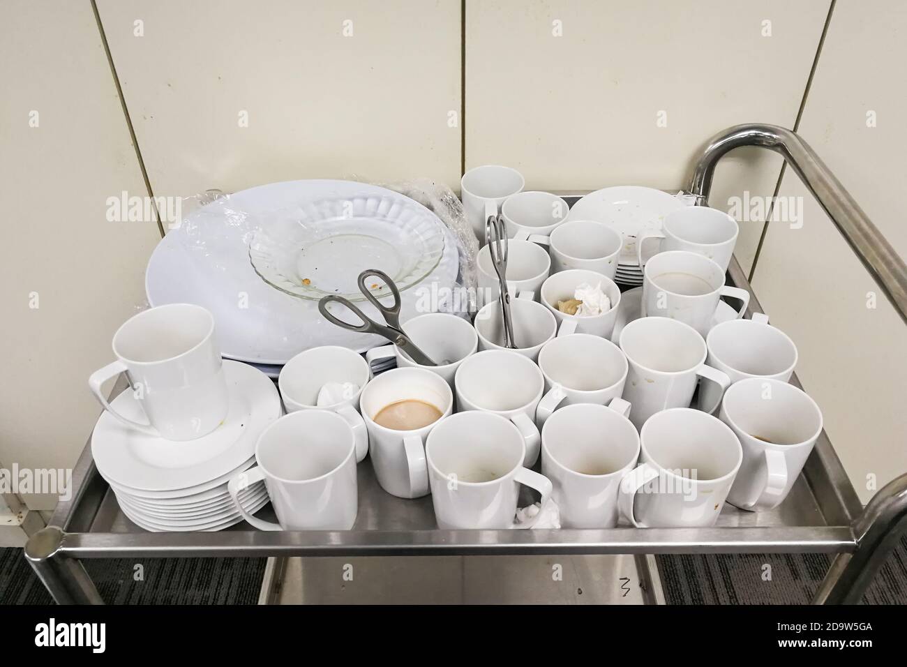 Pile of dirty used cups and plates for cleaning Stock Photo Alamy