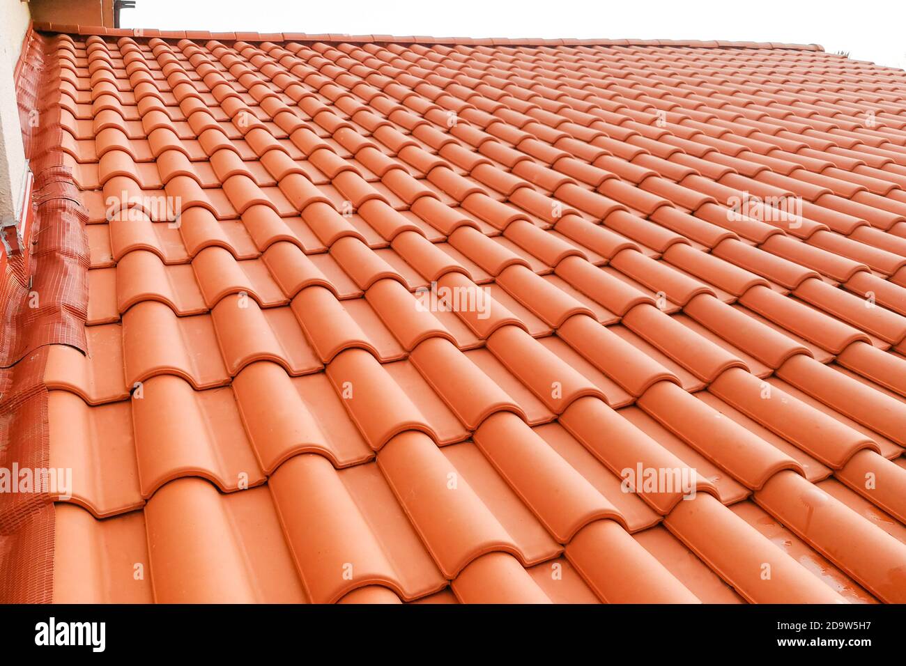 Closeup of new red color clay ceramic roof Stock Photo