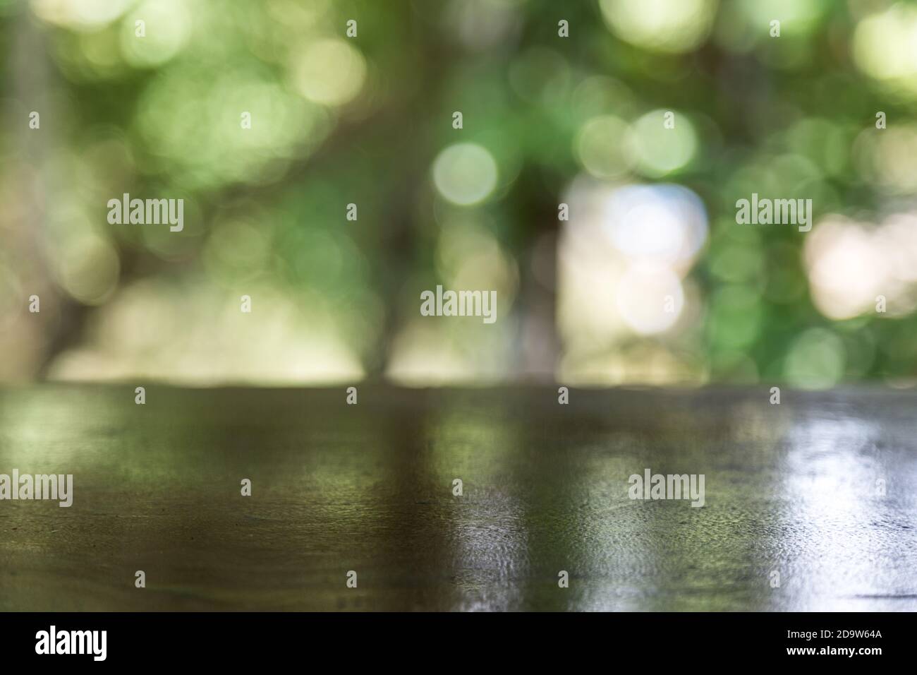 Wooden table top with blurred bokeh greenary nature background Stock ...