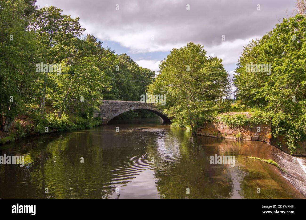 The Blackstone River and the old stone arch bridge in Uxbridge