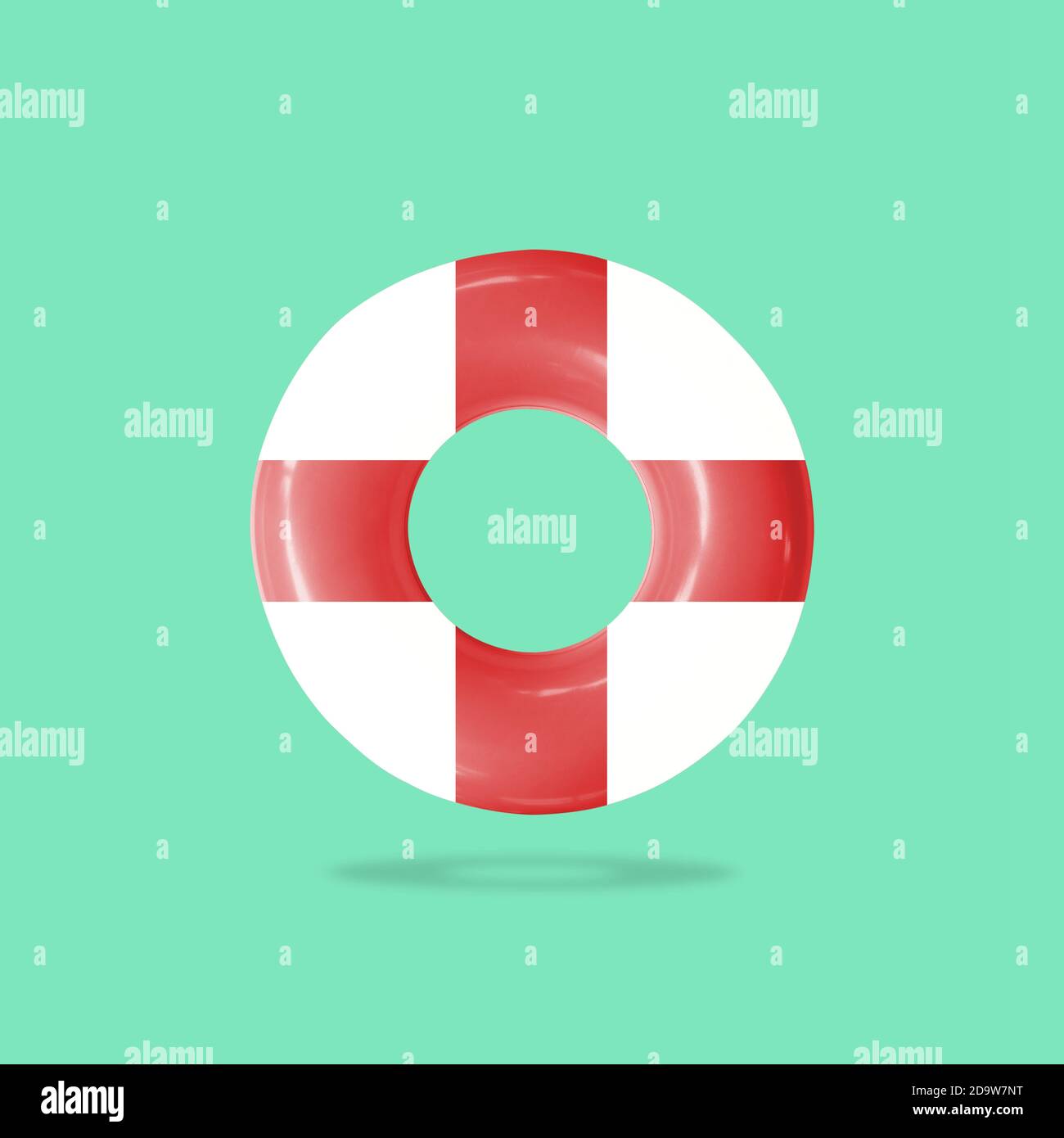 Lifebuoy for helping people in the water isolated on pastels color background, with clipping path. Stock Photo
