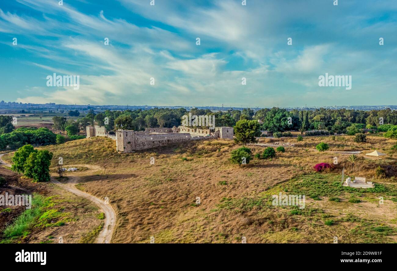 Aerial view of Binar Bashi or Antipatris, Ottoman era stone stronghold in Israel with square layout dreamy cloudy blue sky Stock Photo
