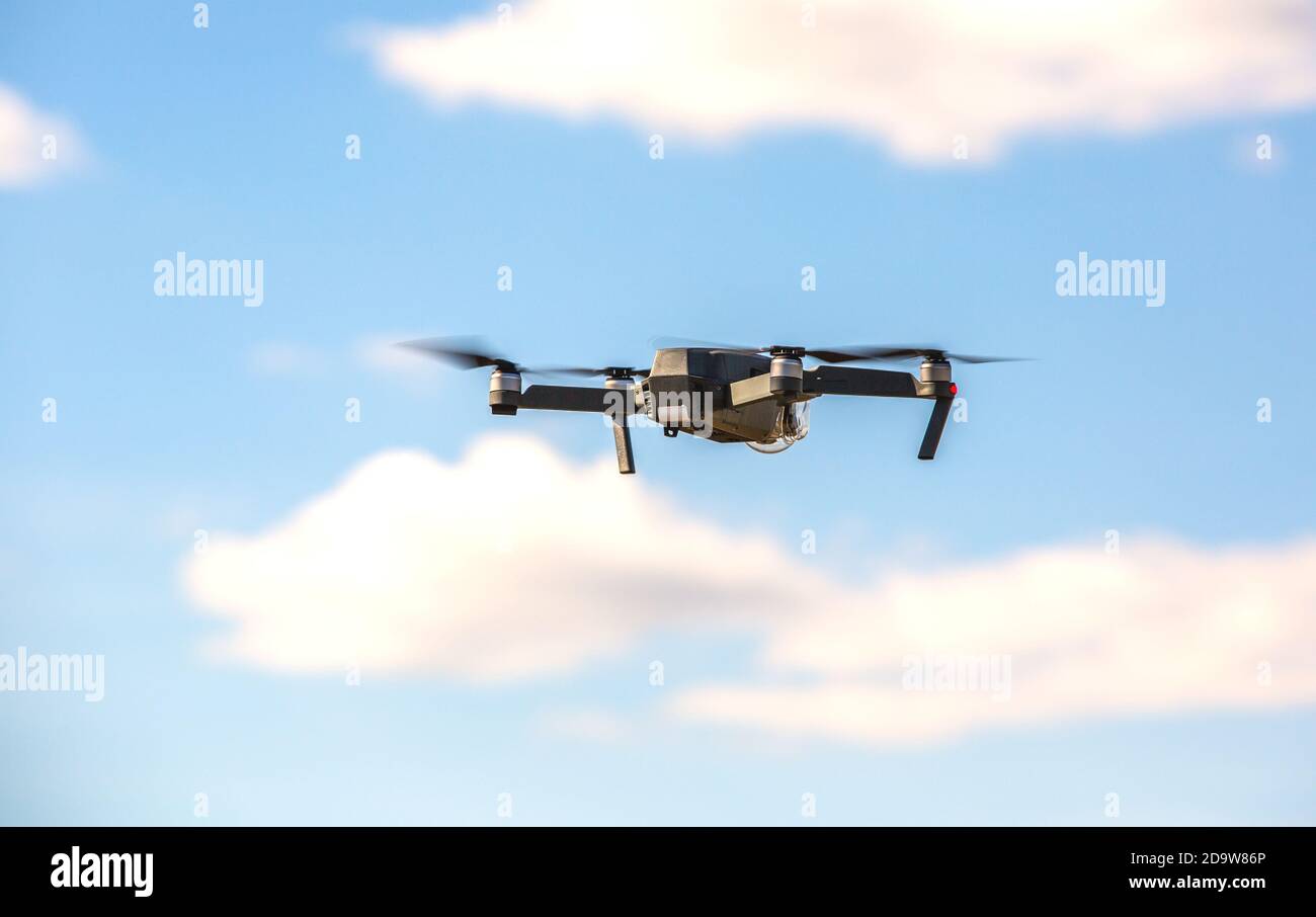 Hovering Quadcopter that Capturing an Image and Filming Stock Photo