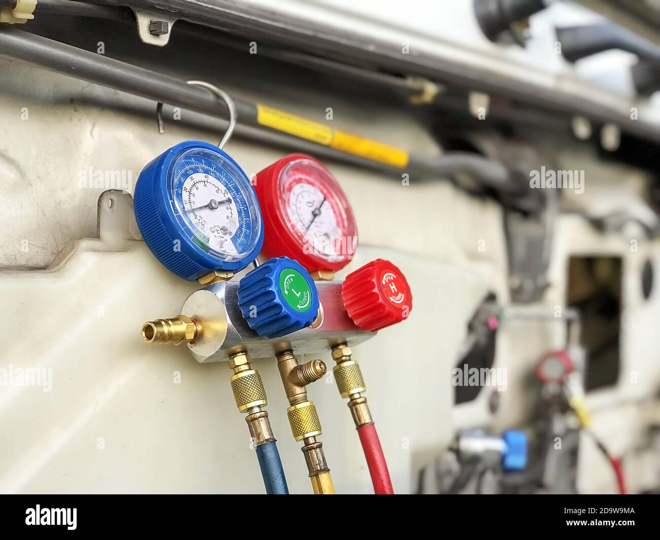 Closeup pressure gauge Car air conditioners hanging in front of trucks Stock Photo Alamy