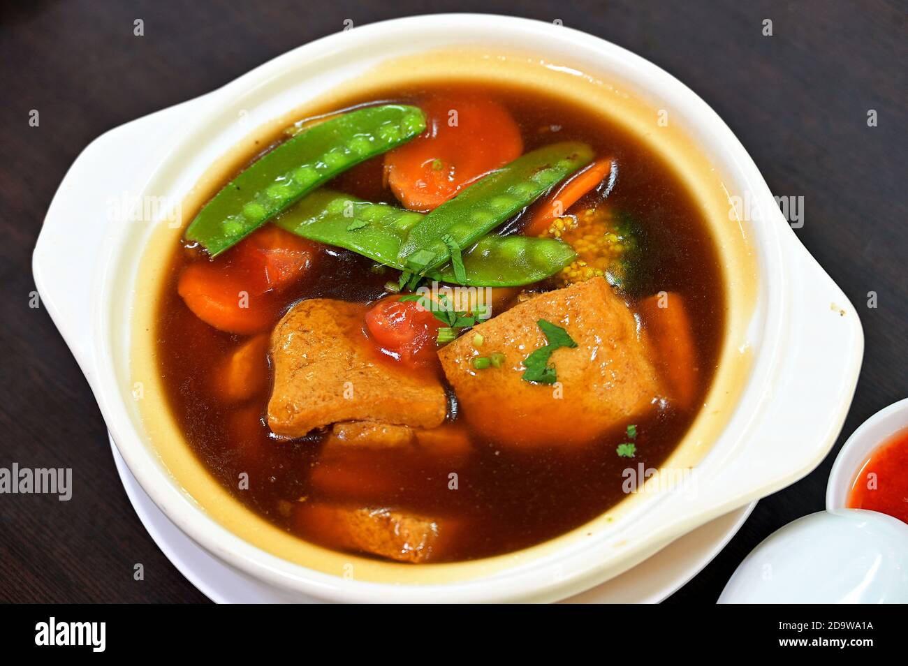A vegetarian dish of Chinese braised tofu and assorted vegetables