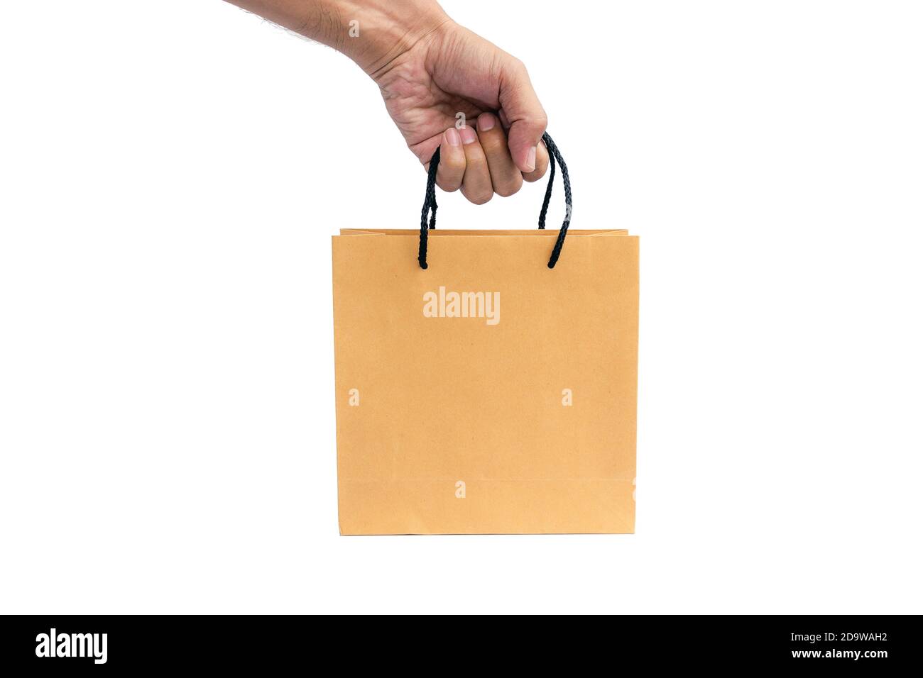 Hand holding paper shopping bag isolated on white background Stock ...