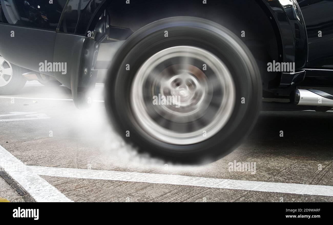 Show drifting car burning tires racing car in racetracks Stock Photo