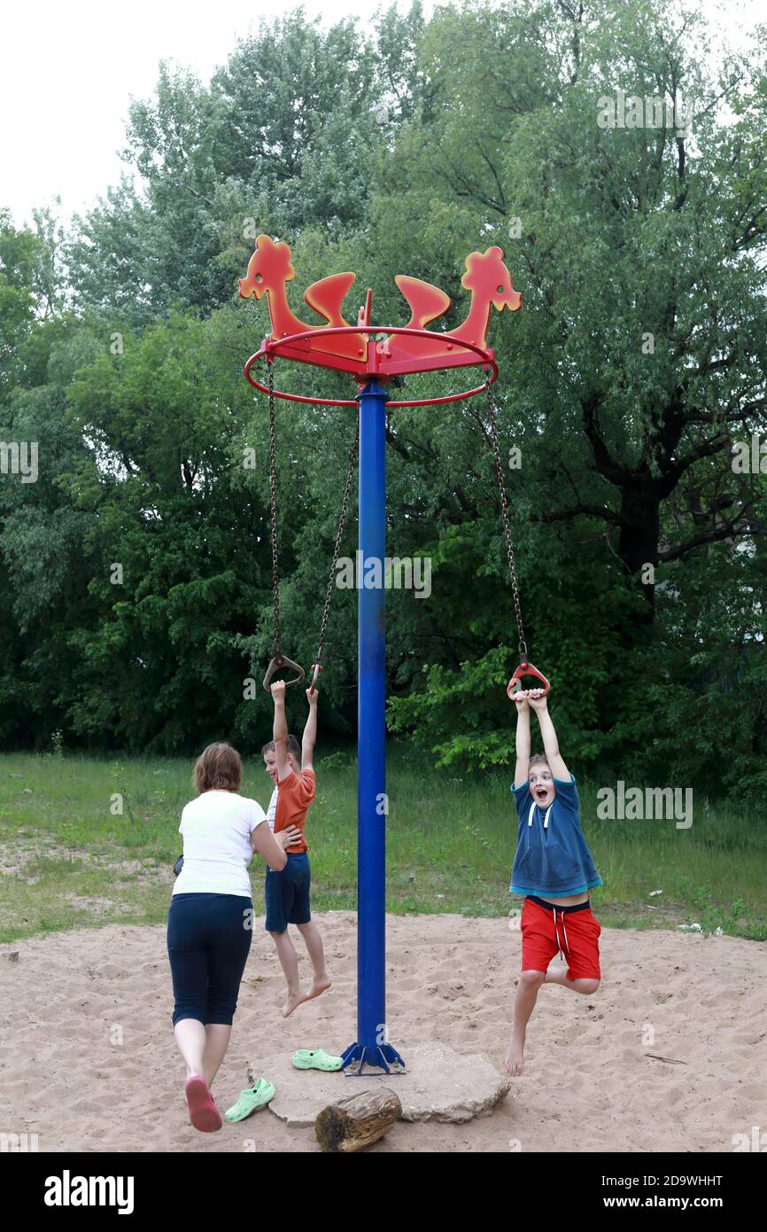 Rope swing adult park hi-res stock photography and images - Alamy