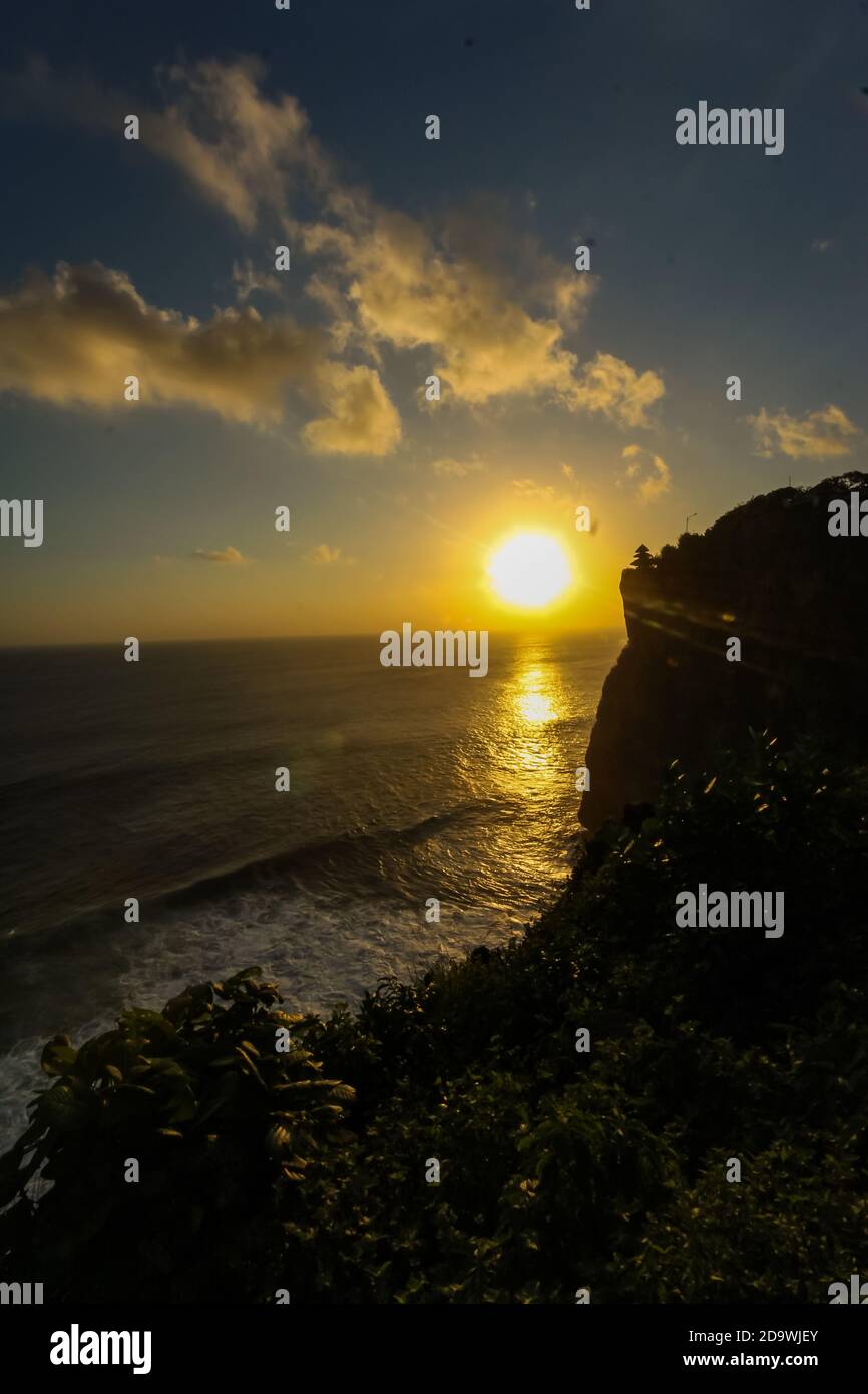 Sunset at Uluwatu Temple at Uluwatu Beach, Bali Stock Photo Alamy