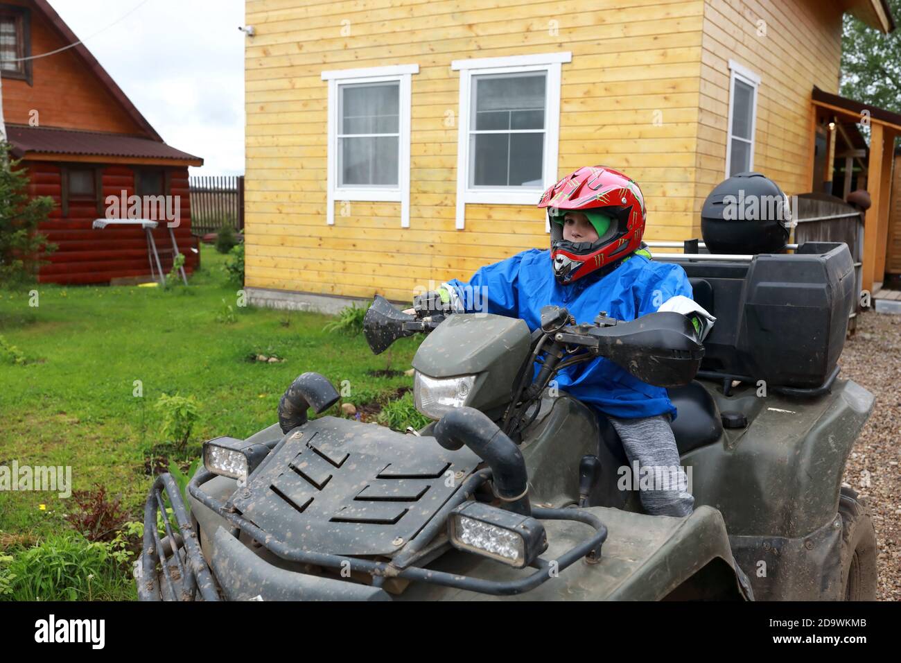 Portrait of boy in motorcycle helmet on ATV Stock Photo Alamy