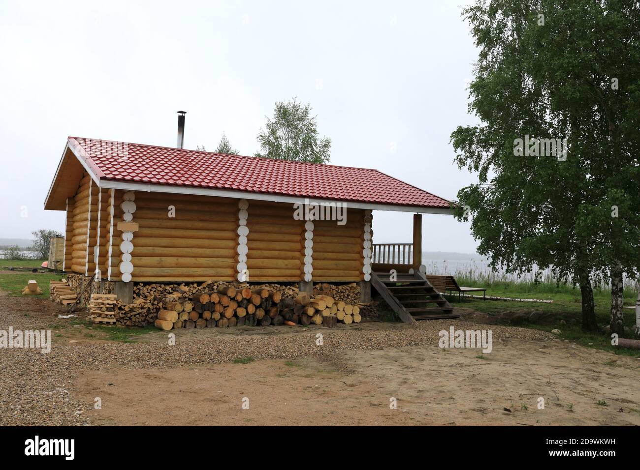 Russian wooden bathhouse on shore of Lake Seliger, Russia Stock Photo