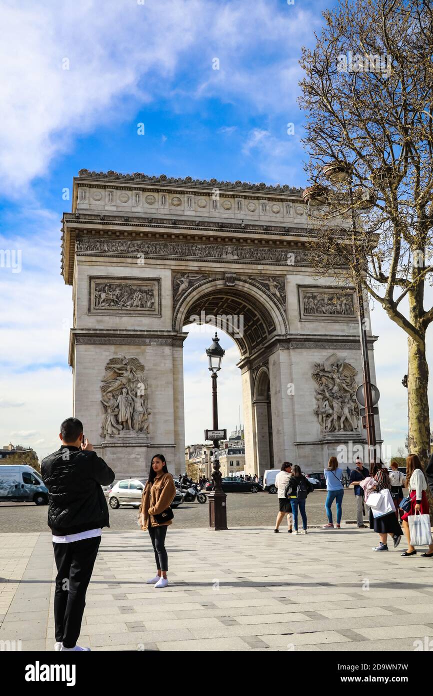 Paris/France - September 10, 2019 : Asian tourist girl with a Louis Vuitton  shopping bag on Champs-Elysees avenue Stock Photo - Alamy