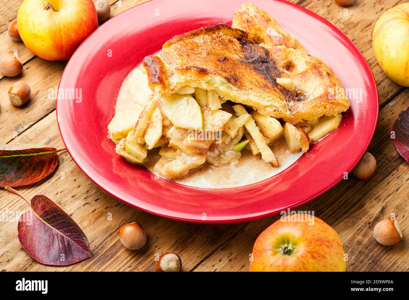 Tasty sweet apple pie on wooden table Stock Photo
