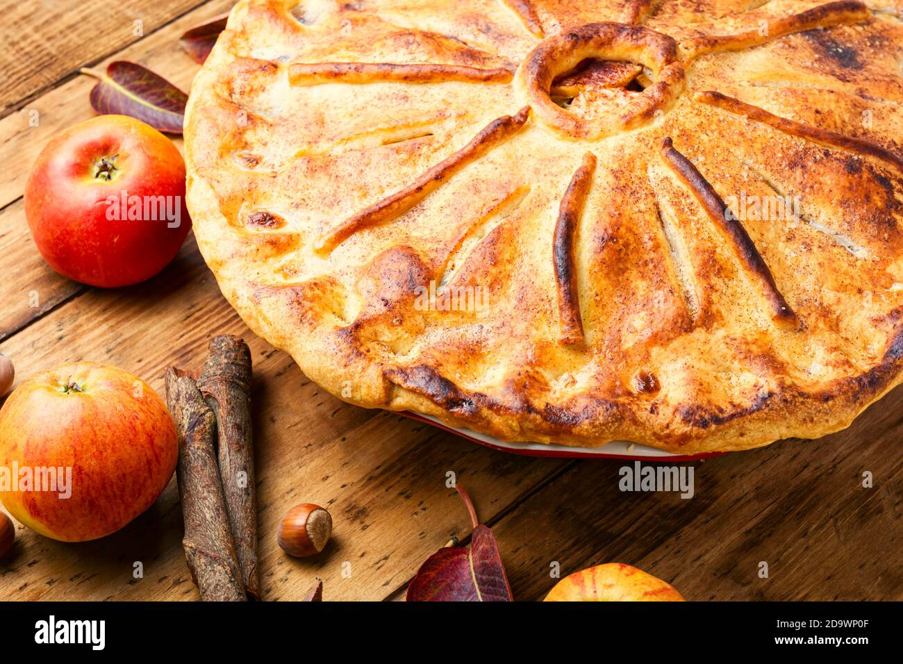 Tasty homemade apple pie on wooden table Stock Photo