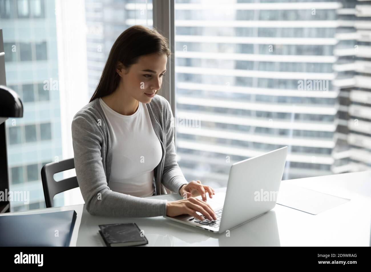 Paperwork young woman typing on hi-res stock photography and images - Alamy