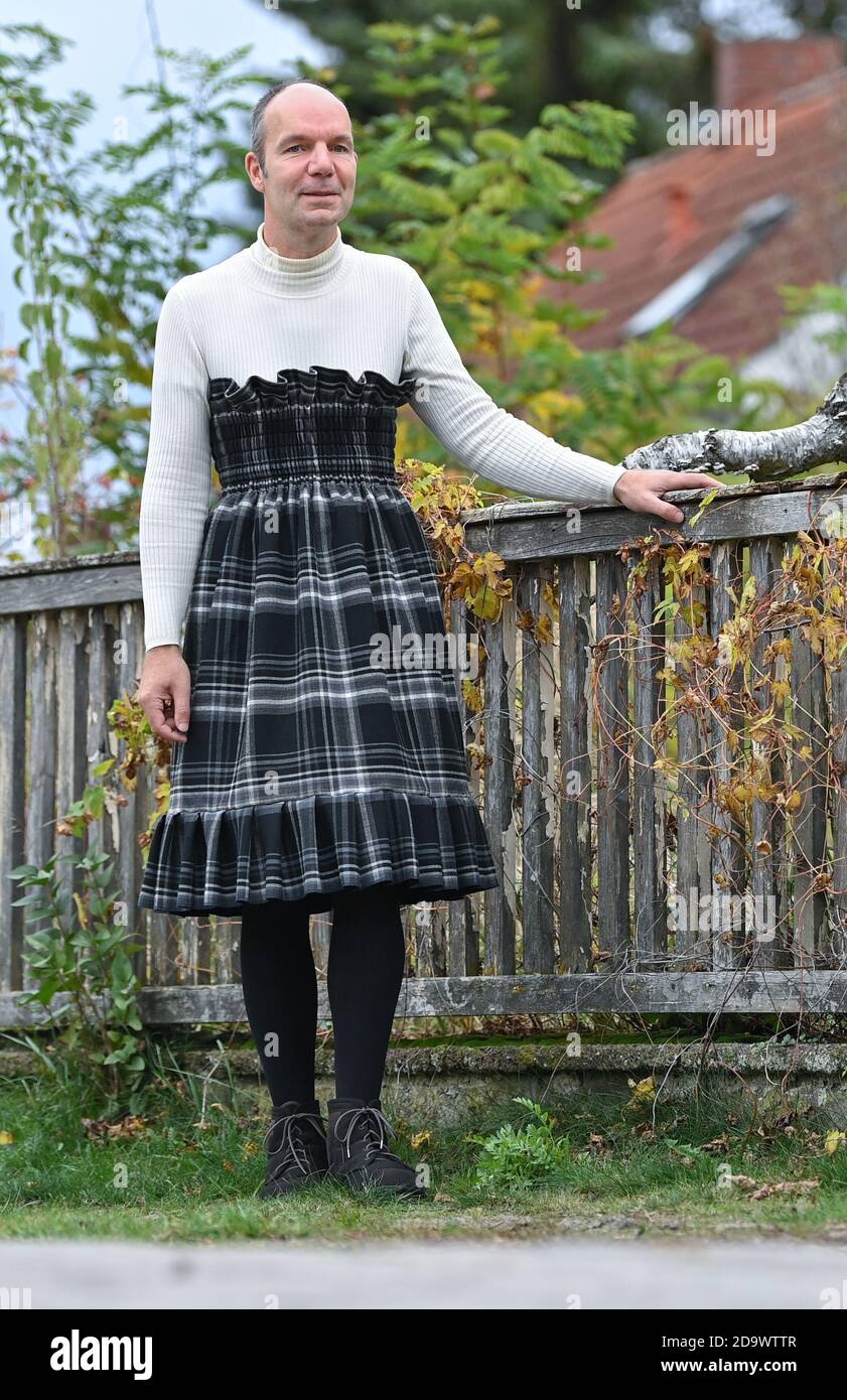 Wernsdorf, Germany. 28th Oct, 2020. Lars Pohlmann poses in a self-stitched  skirt. Man wears skirt again. At least that is the case with Lars Pohlmann.  And he is probably not the only