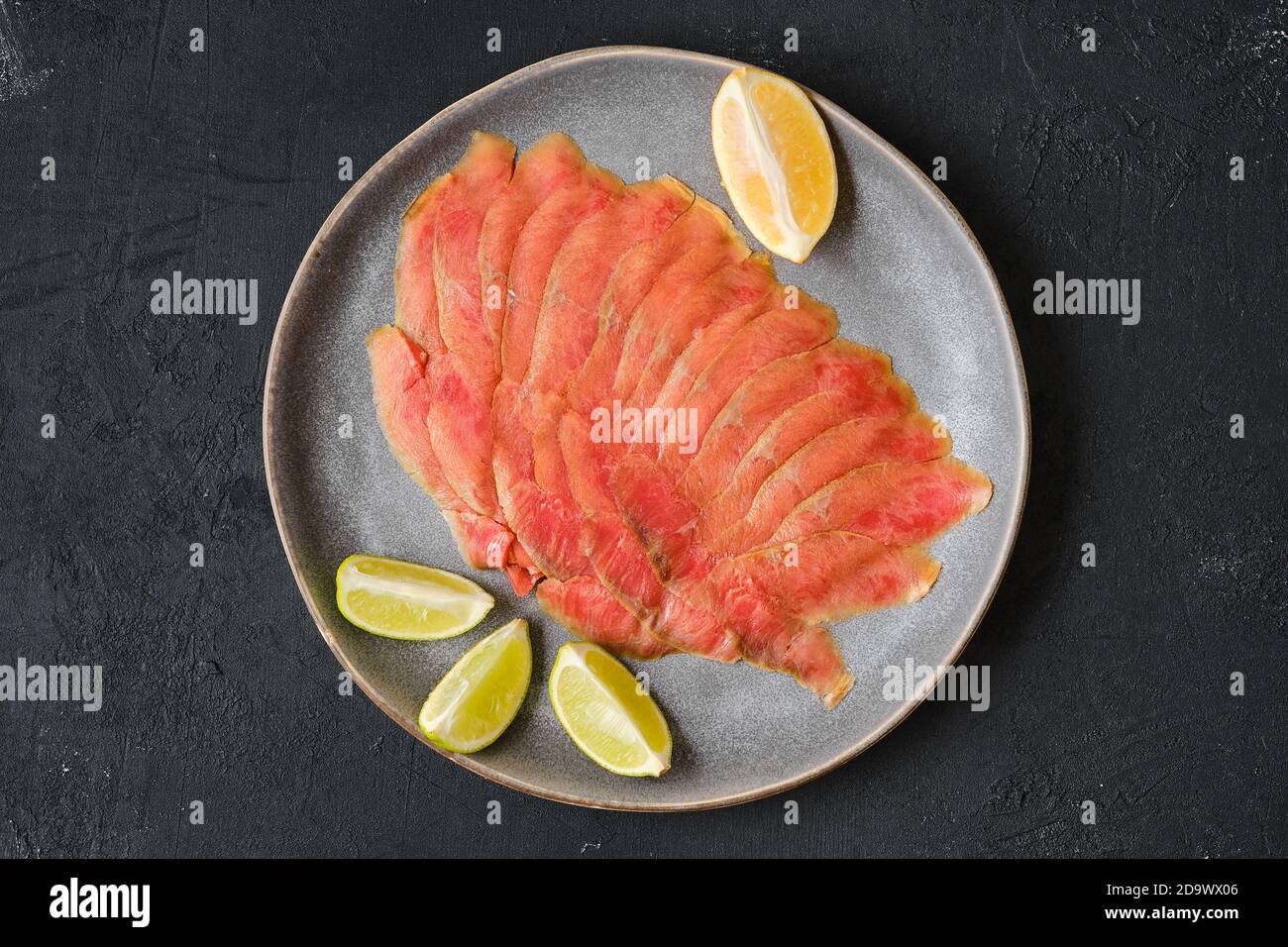 https://c8.alamy.com/comp/2D9WX06/top-view-of-smoked-thin-slices-of-salmon-fillet-2D9WX06.jpg