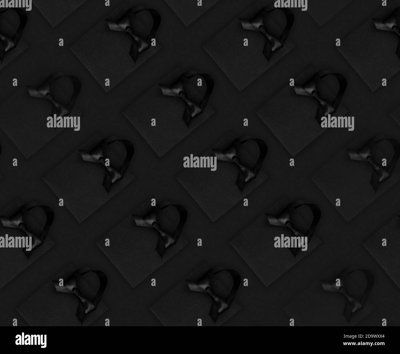 Seamless background Black shopping bags and gift boxes on black, Black Friday sale shopping concept Stock Photo