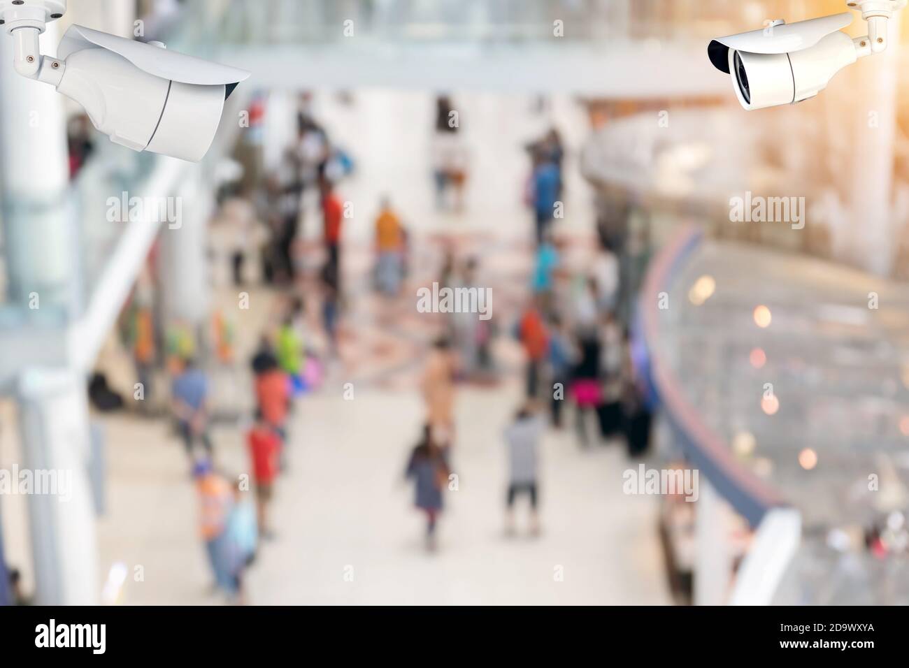Security cameras (CCTV) or surveillance camera inside the airport terminal to the various internal security. Stock Photo