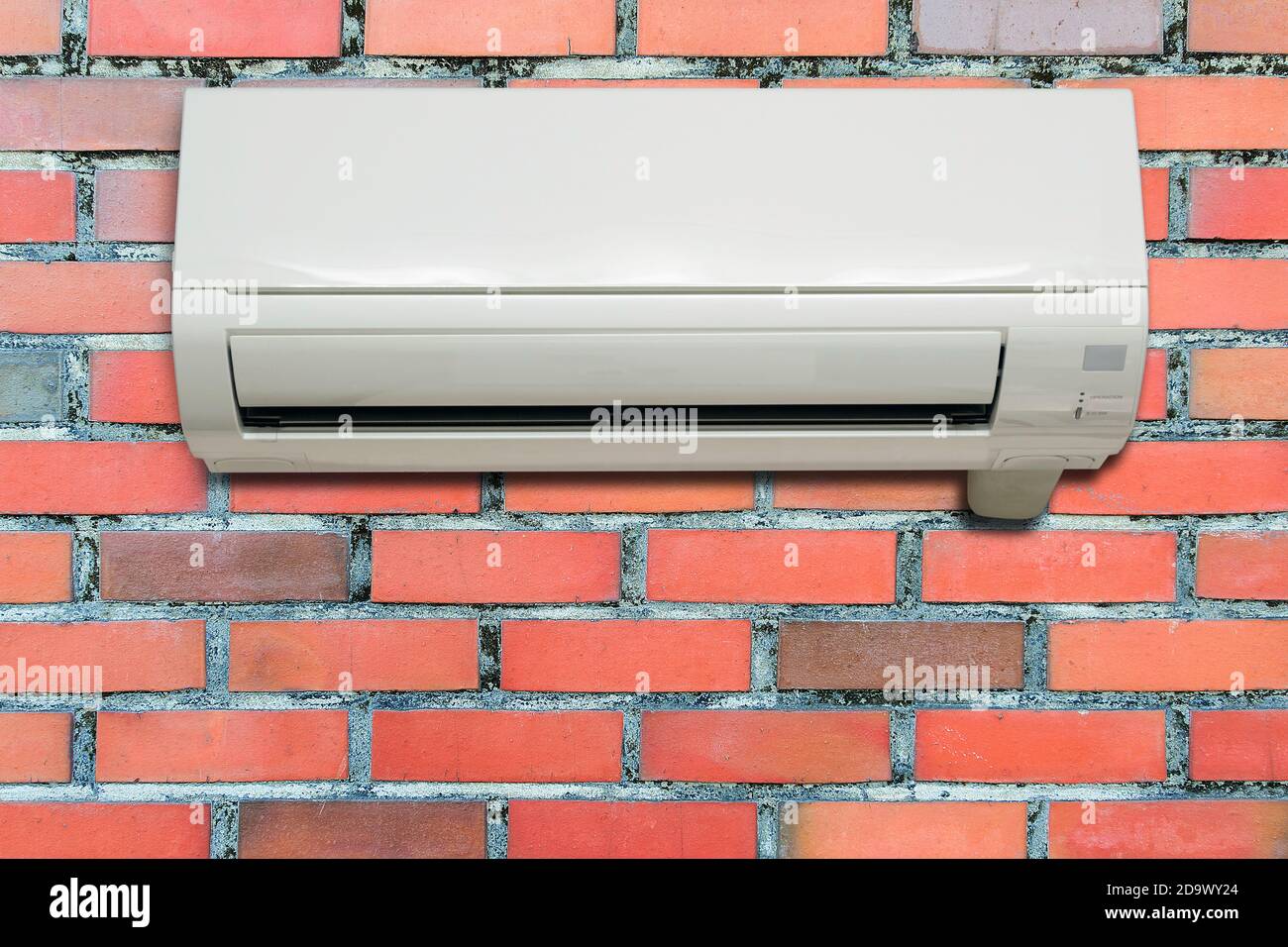 Wall air conditioning hanging on a brick wall in the bedroom Stock Photo Alamy