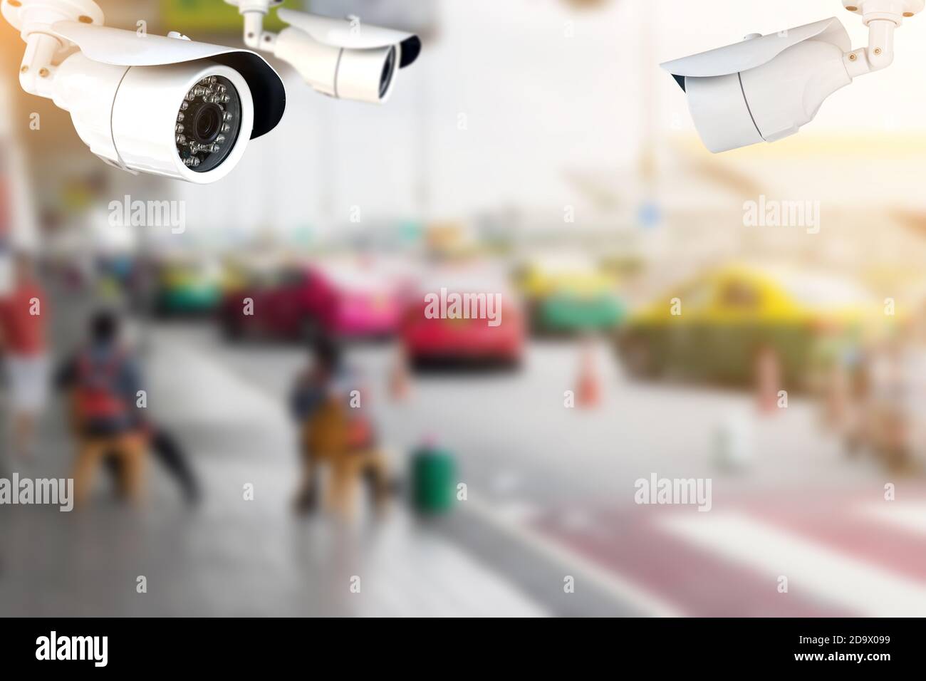 CCTV or surveillance camera recording of traffic in the parking lot for taxis carry passengers