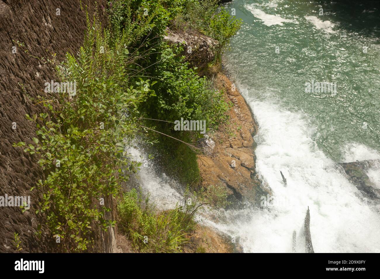 mountain river with a steep wall Stock Photo