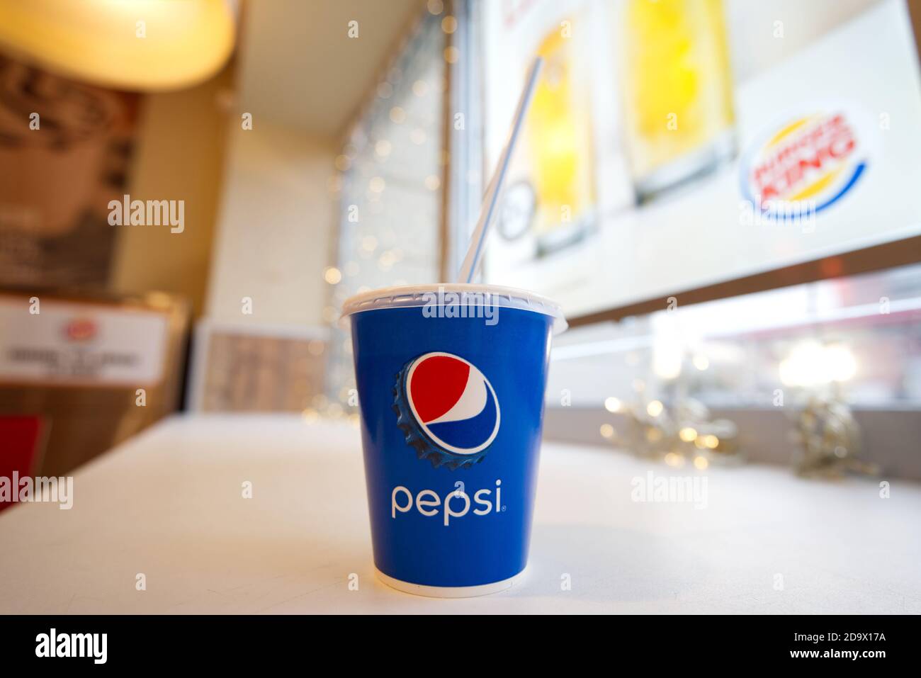 Pepsi paper soda cup on table in Burger King fast food restaurant Stock Photo