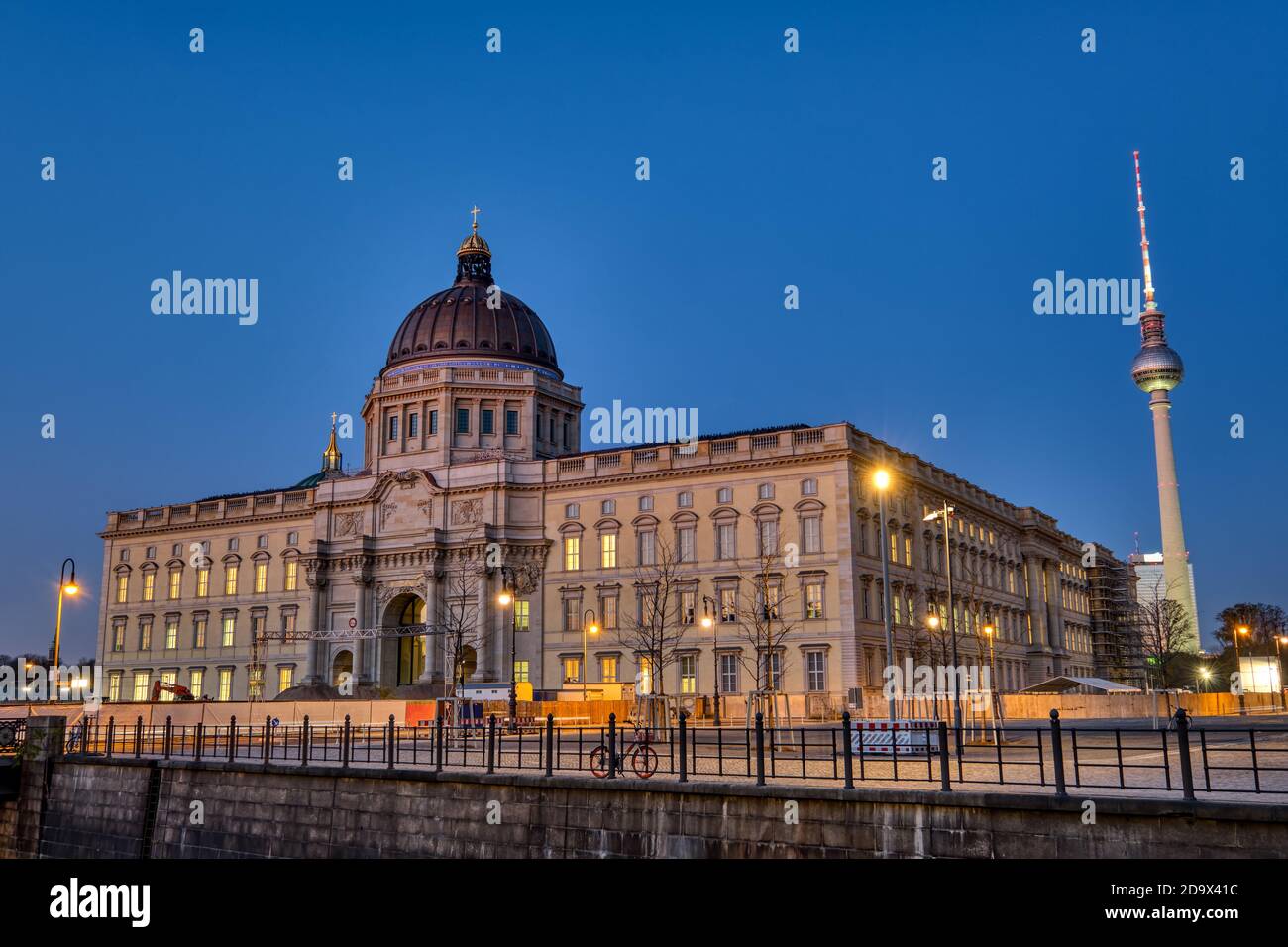 The reconstructed Berlin City Palace with the Television Tower at night Stock Photo