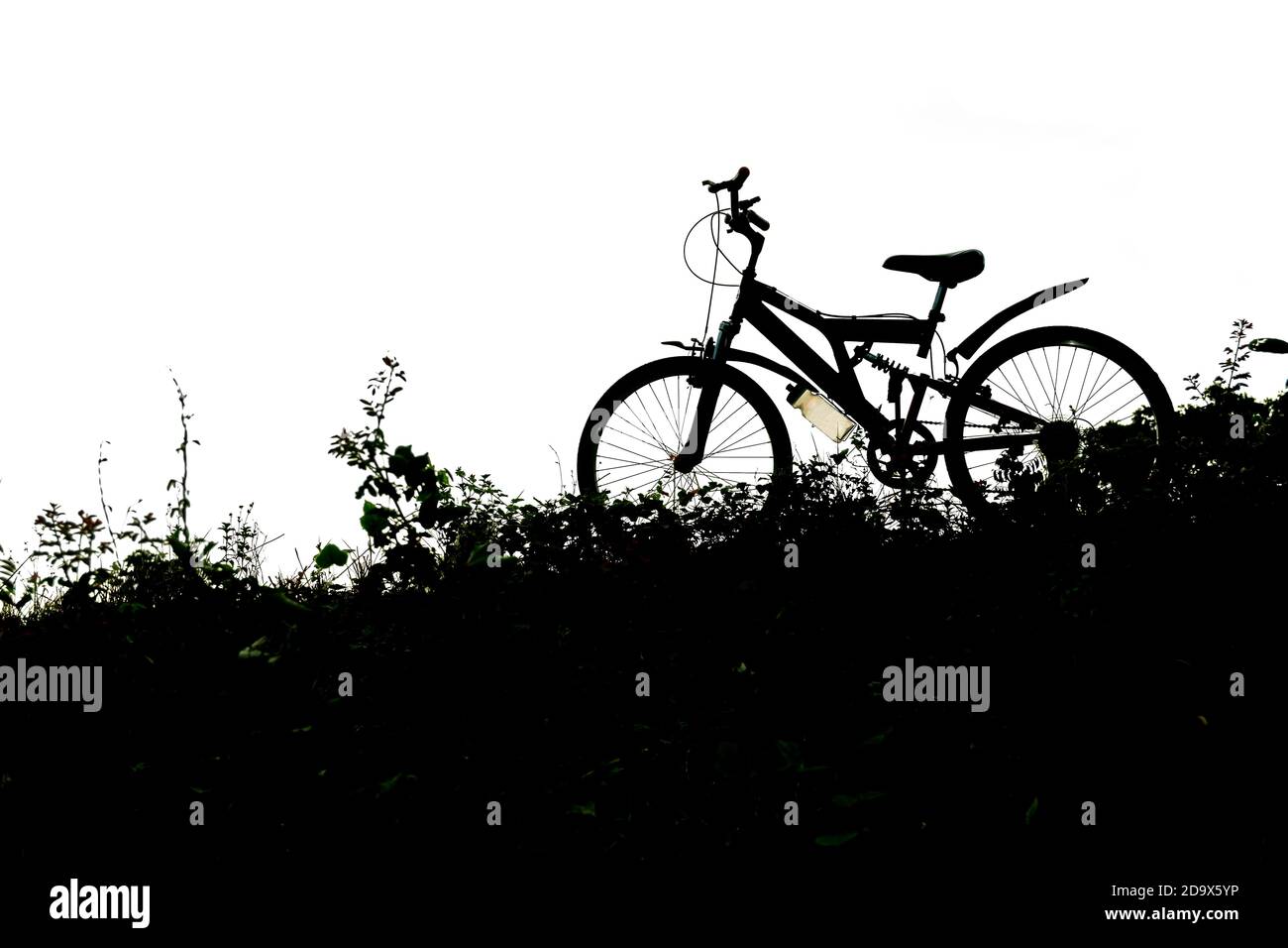 Silhouette of the mountain bike ;black and white filter Stock Photo Alamy