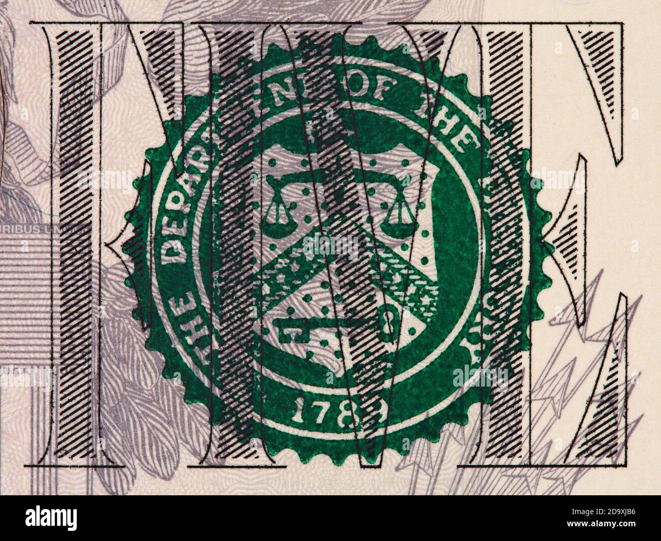 Five us dollar bill fragment with treasury seal macro, united states money closeup Stock Photo
