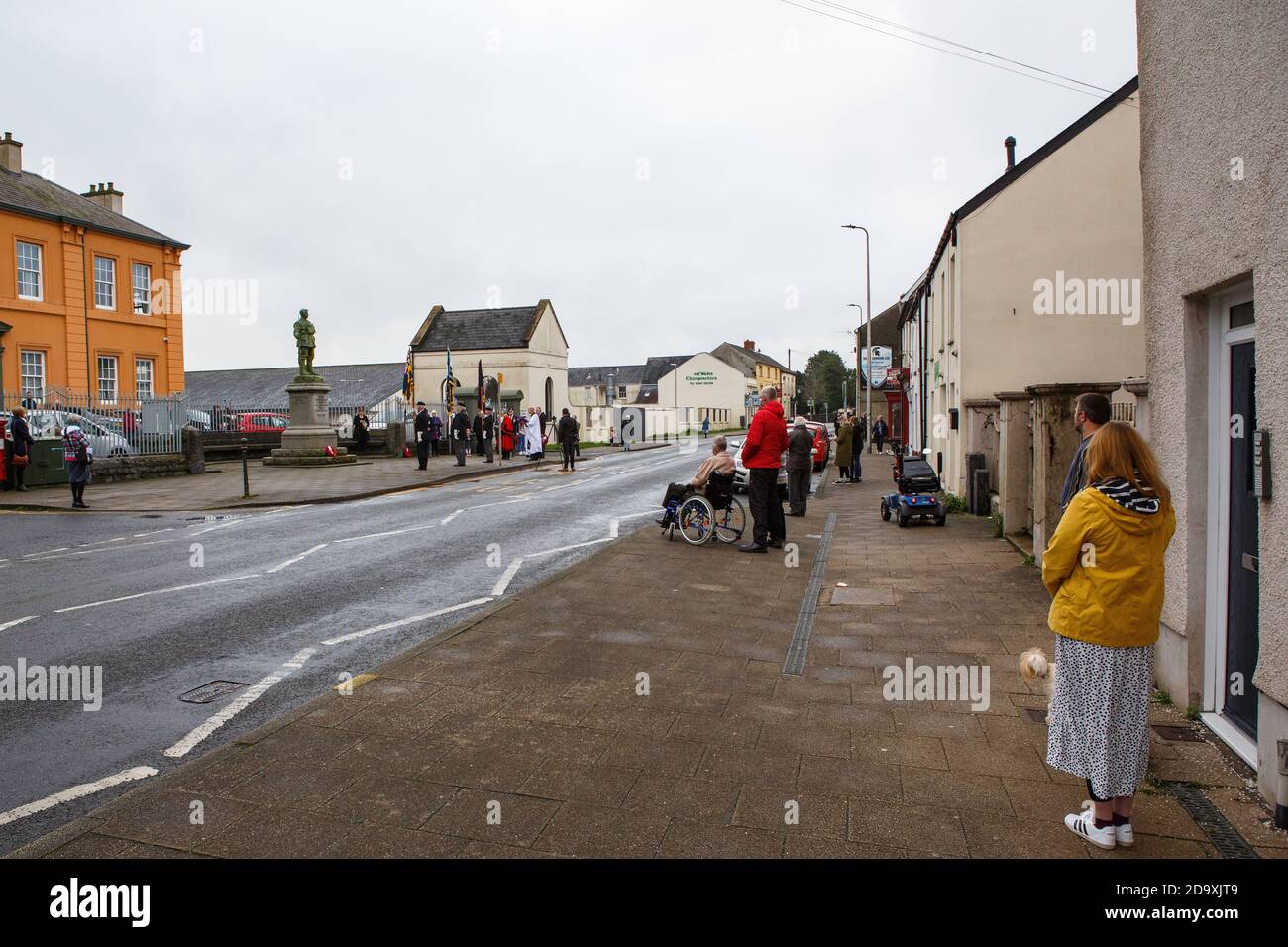 Carmarthen, Carmarthenshire, Wales, UK. 8 November, 2020. Due to Covid-19 "fire break" restrictions, a scaled-back Remembrance Day parade in Carmarthen, Carmarthenshire, west Wales. Credit: Gruffydd Ll. Thomas Credit: Gruffydd Thomas/Alamy Live News Stock Photo