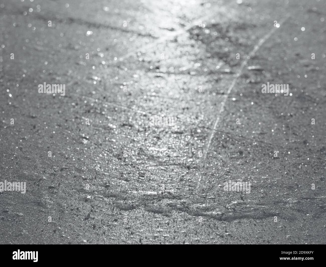 Ice hockey rink surface closeup, scate traces, winter sport background, selective focus, shallow depth of field Stock Photo