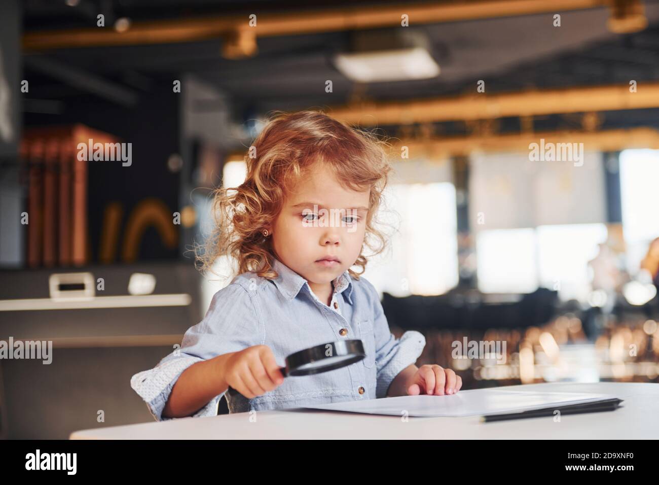 Child have fun in playroom. Kindergarten educational games Stock Photo