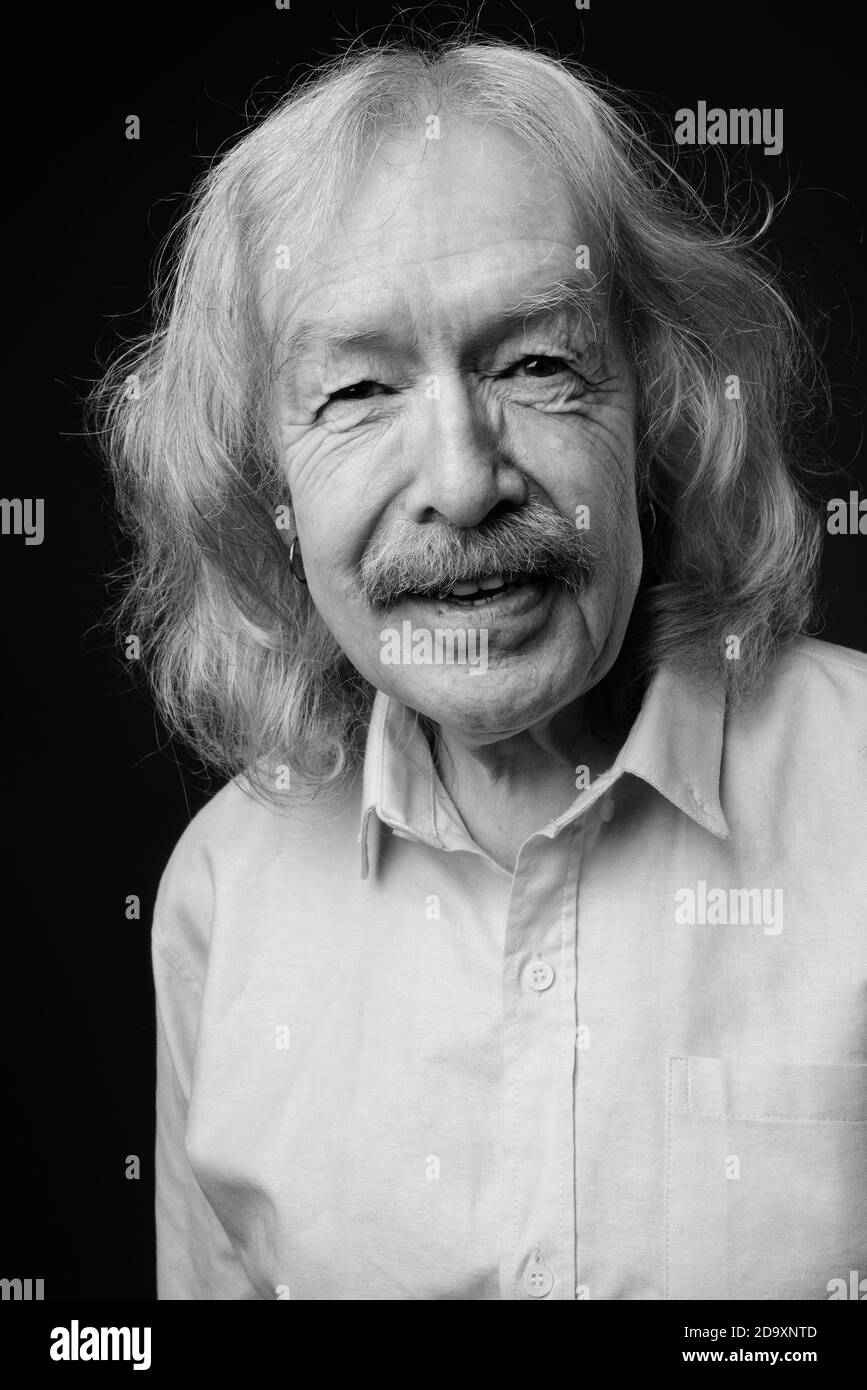 Portrait man wearing pink shirt Black and White Stock Photos & Images