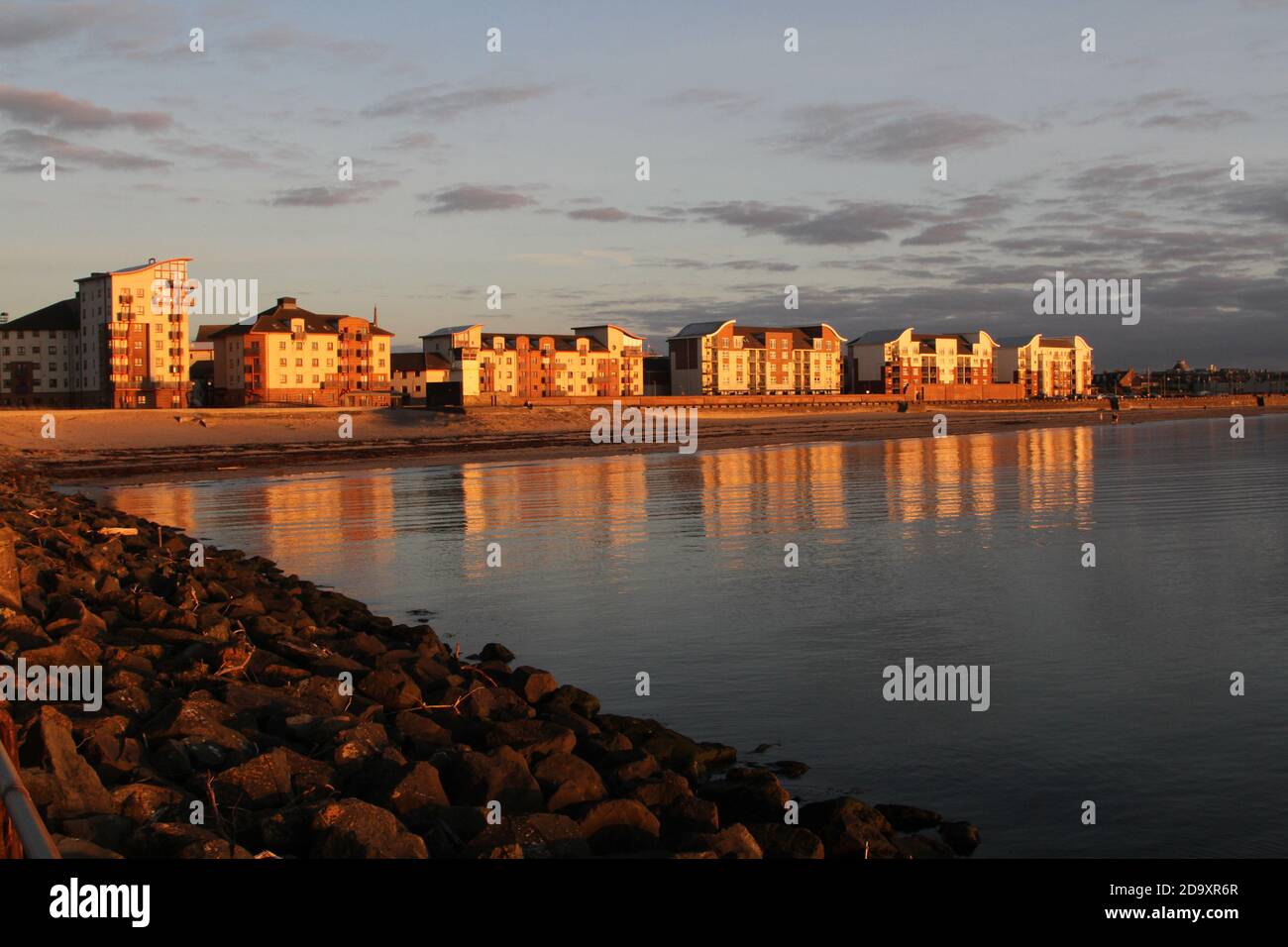Scotland Ayrshire Sunset Ayr Bay and harbour Reflection of flats in the