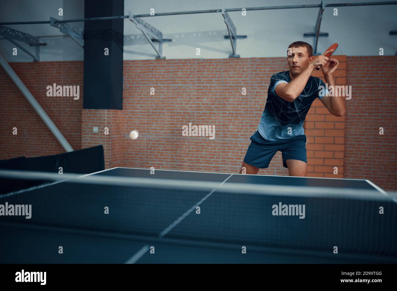 Man hits the ball, table tennis, ping pong player Stock Photo Alamy
