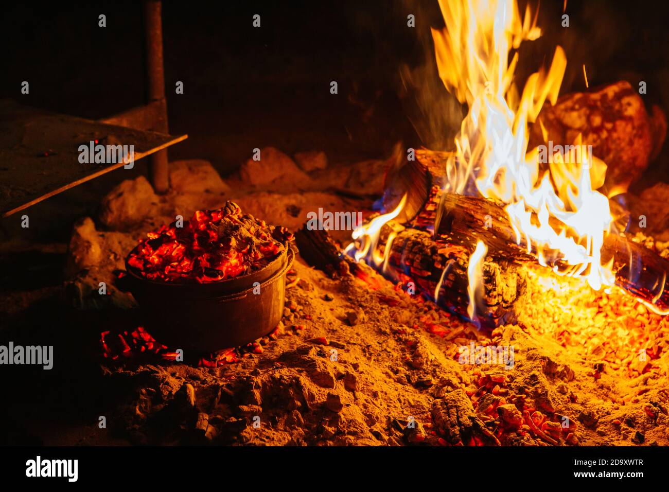 Cooking Damper on a Fire in Australia Stock Photo