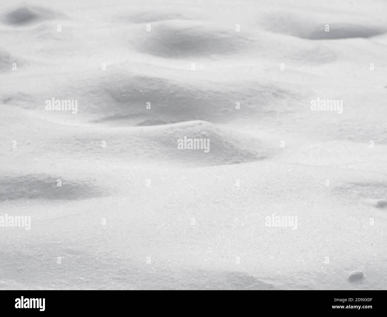 Bumpy mound snow surface background, shallow depth of field Stock Photo ...