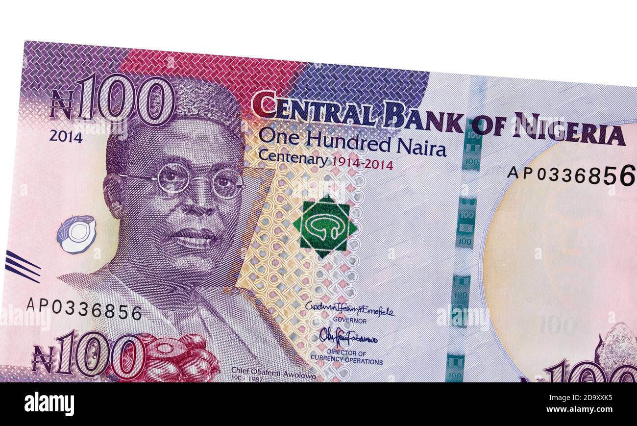 Nigeria 100 naira (2014) banknote isolated, Nigerian money closeup. Portrait of Obafemi Awolowo. Stock Photo