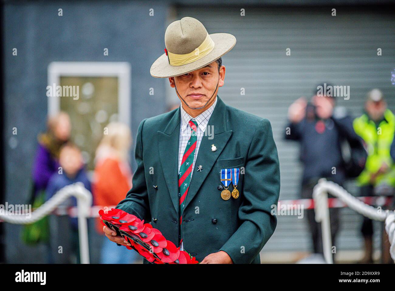 Gurkha in Swindon Town Regent circus town hall laying a poppy wreath in respect of loved ones lost in war 8/11/2020 Stock Photo