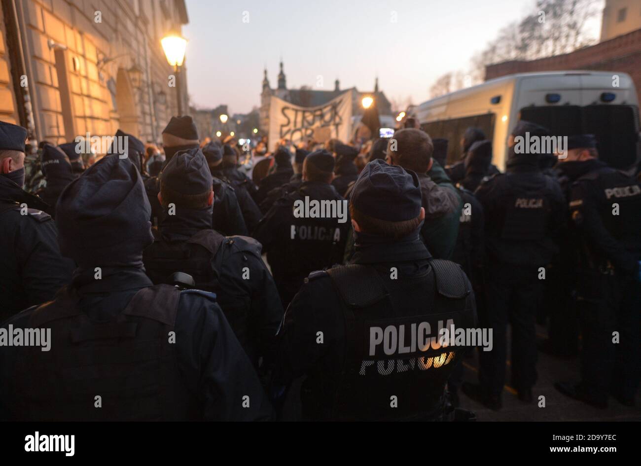 Krakow, Poland. 7 November, 2020.  Police blocking Pro-Choice activists during another day of protests in Krakow's Old Town. Pro-Choice and women's rights activists and their supporters organised on Saturday evening another anti-government protest in Krakow to express their anger at the Supreme Court ruling in relation to abortion laws.. Credit: ASWphoto/Alamy Live News Stock Photo