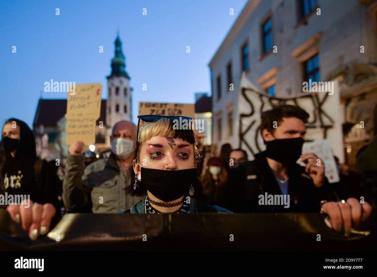 Krakow, Poland. 7 November, 2020.  Pro-Choice activists during another day of protests in Krakow's Old Town. Pro-Choice and women's rights activists and their supporters organised on Saturday evening another anti-government protest in Krakow to express their anger at the Supreme Court ruling in relation to abortion laws.. Credit: ASWphoto/Alamy Live News Stock Photo