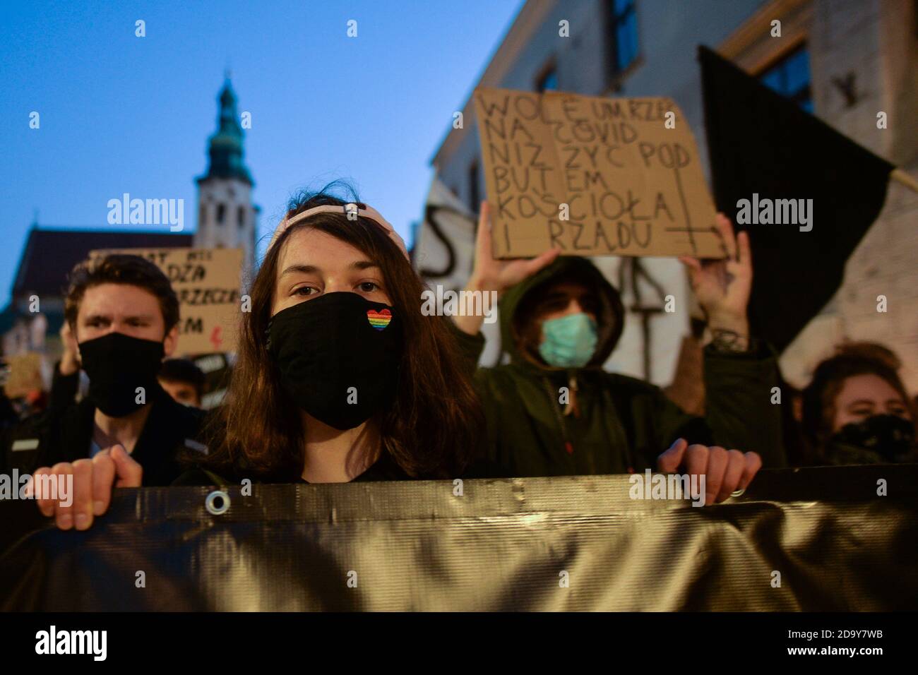 Krakow, Poland. 7 November, 2020.  Pro-Choice activists during another day of protests in Krakow's Old Town. Pro-Choice and women's rights activists and their supporters organised on Saturday evening another anti-government protest in Krakow to express their anger at the Supreme Court ruling in relation to abortion laws.. Credit: ASWphoto/Alamy Live News Stock Photo