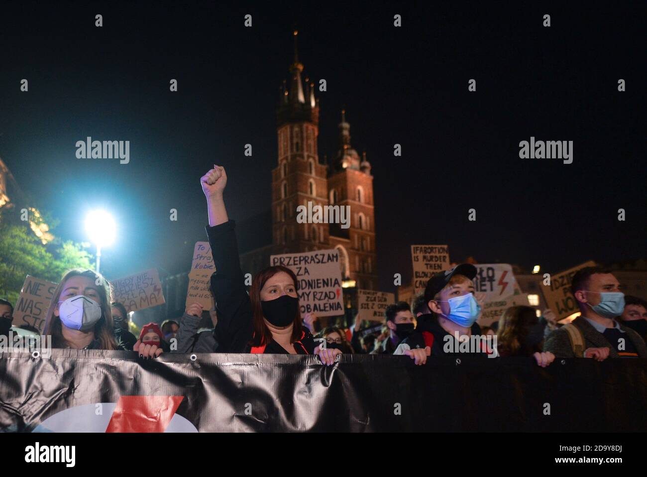 Krakow, Poland. 7 November, 2020.  Pro-Choice activist gesture during a protest in Krakow's Market square. Pro-Choice and women's rights activists and their supporters organised on Saturday evening another anti-government protest in Krakow to express their anger at the Supreme Court ruling in relation to abortion laws.. Credit: ASWphoto/Alamy Live News Stock Photo