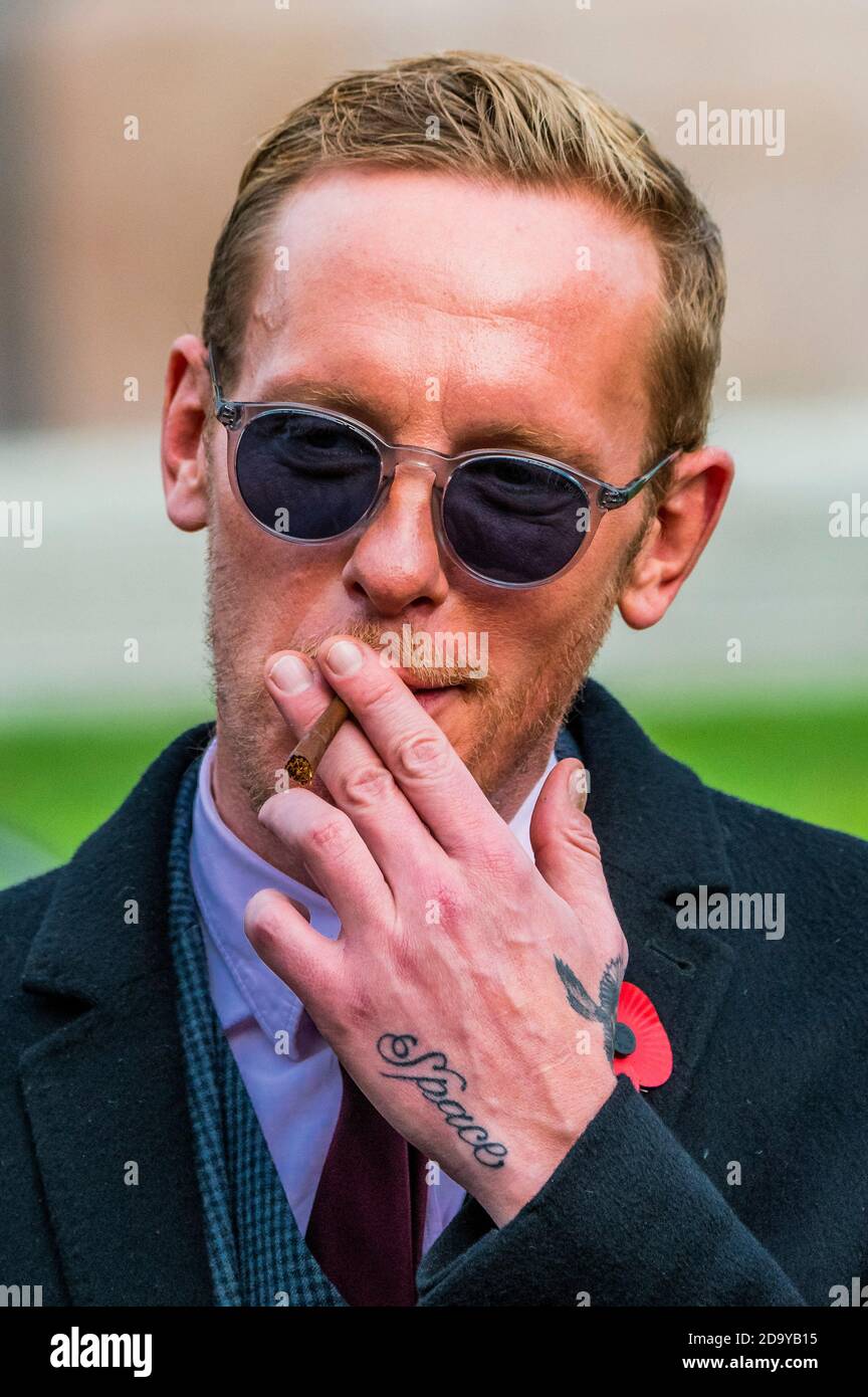 London, UK. 08th Nov, 2020. Laurence Fox, Reclaim Party leader, pays his respects on Remembrance Sunday at the Royal Artillery war memorial at Hyde Park Corner - he was joined by a small group of veterans and supporters as they made their way from Green Park. It is remembrance Sunday and due to the second Coronavirus Lockdown, services of commemoration are greatly curtailed. Credit: Guy Bell/Alamy Live News Stock Photo