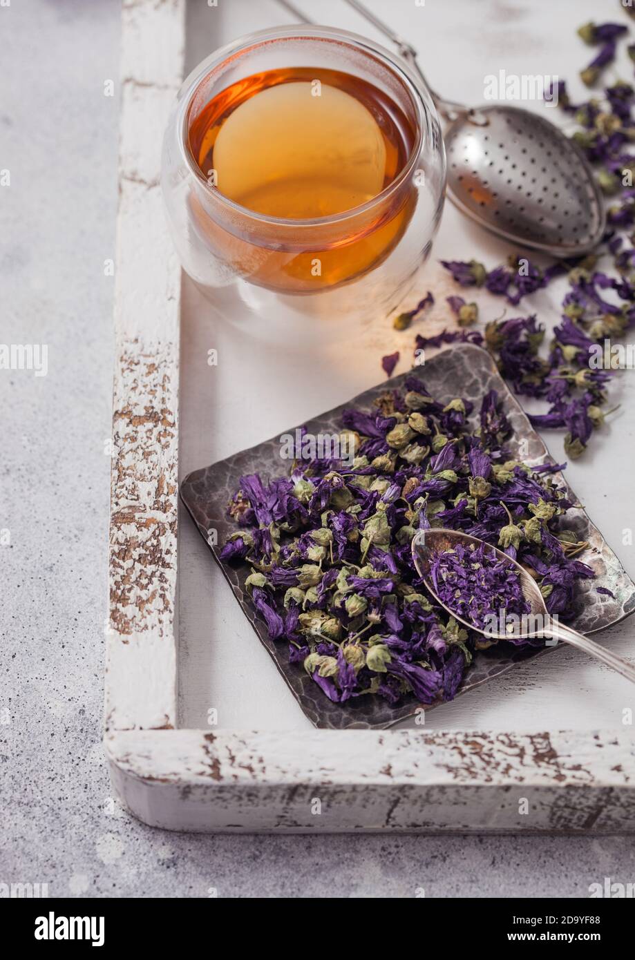 Blue Mallow Flowers Herbal Tea With Vintage Strainer Infuser In Wooden Box On White Table Background Macro Stock Photo Alamy
