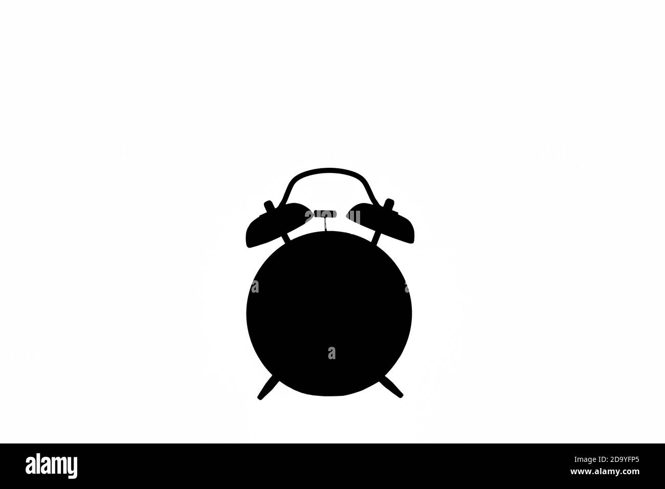 Vector of a black silhouette alarm clock. Isolated white background. alarm  clock side view profile Stock Photo - Alamy